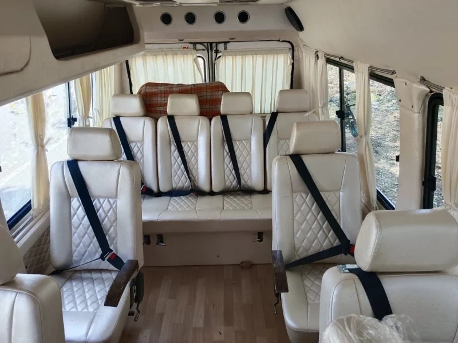 9 Seater Tempo Traveller